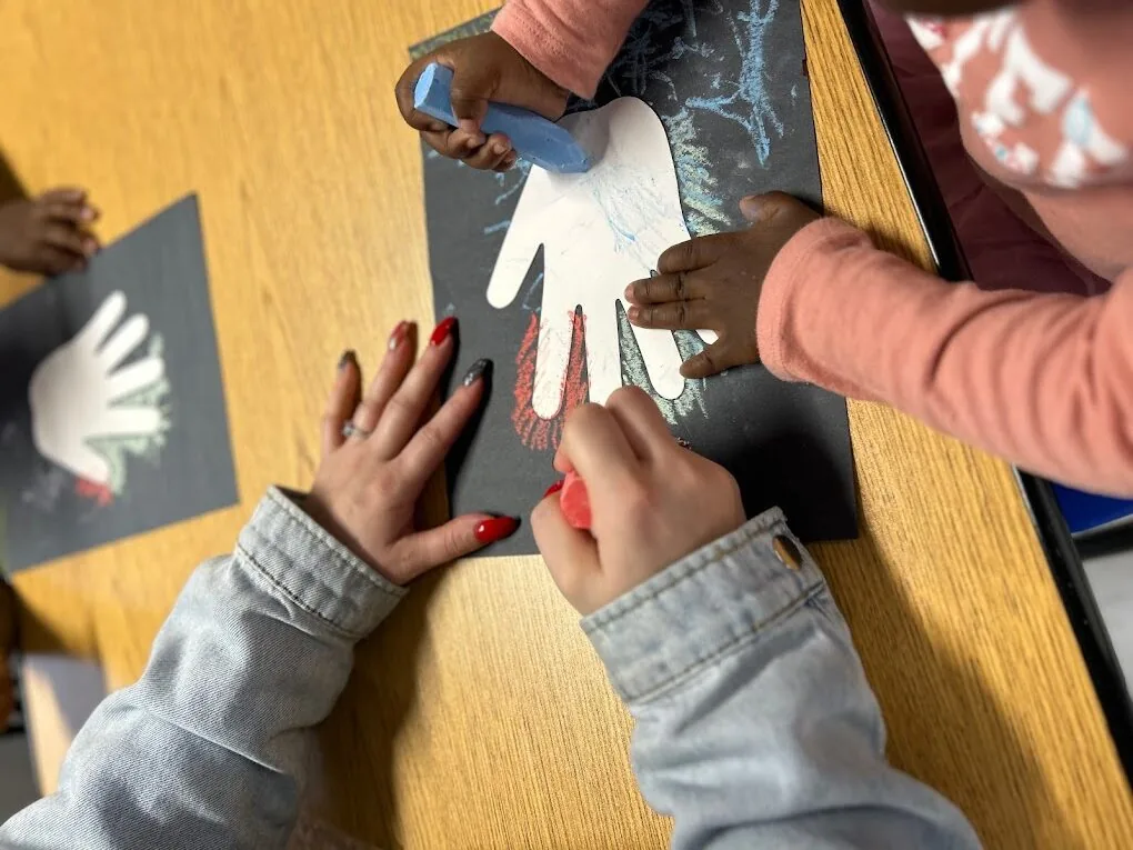 Children learning together at KIMA